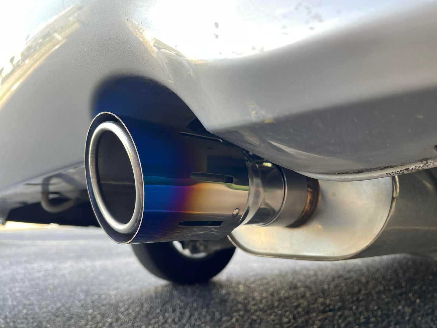 Top Speed Pro1 dual-layer burnt titanium exhaust tip installed example